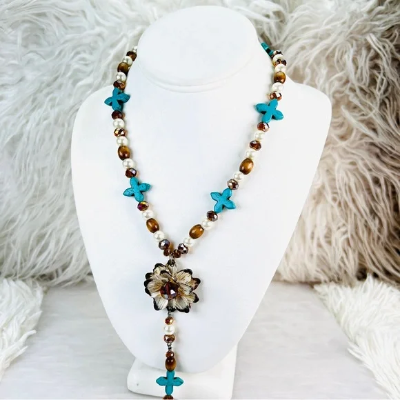 Beautiful weighted bohemian chic long statement necklace